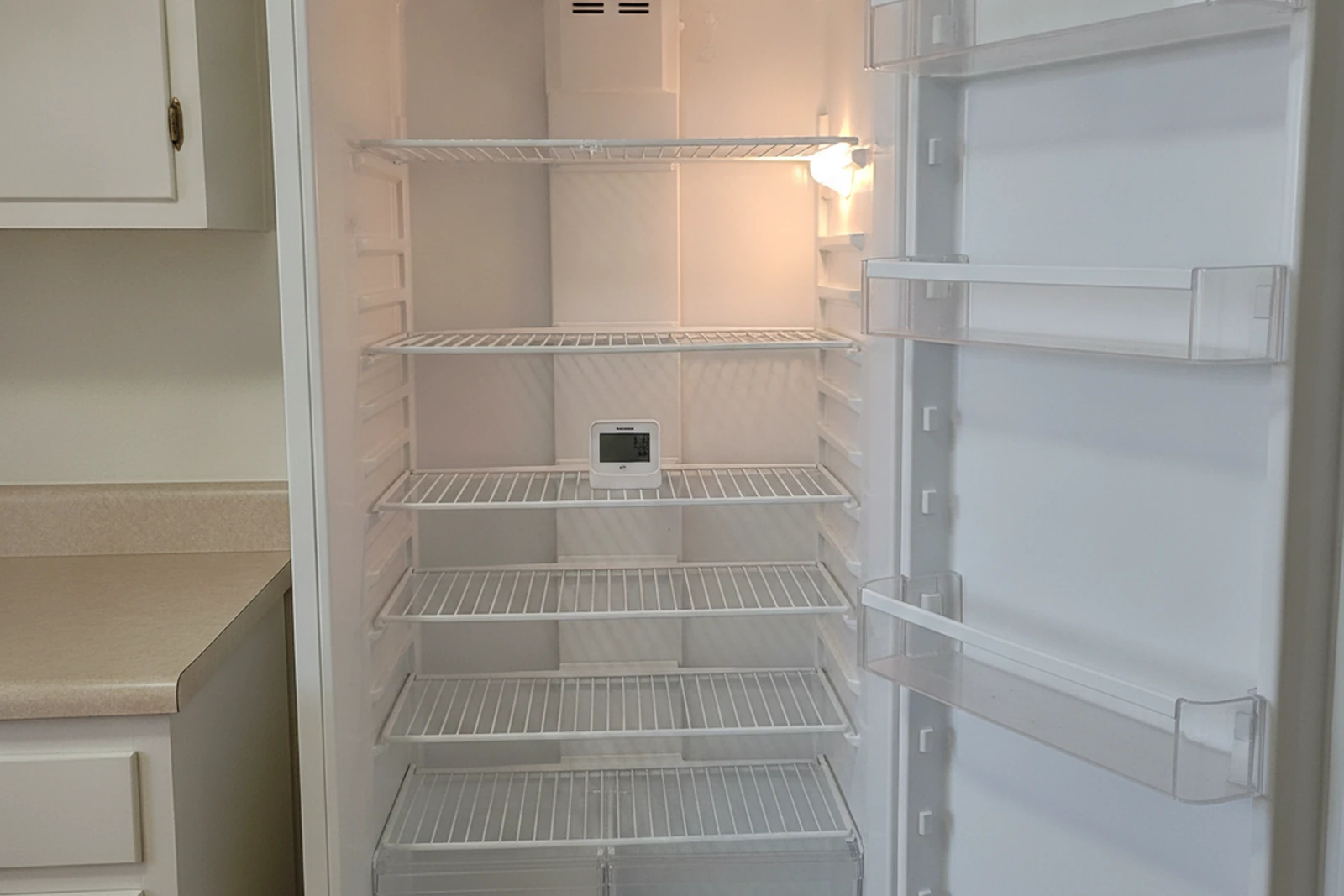 Refrigerator stopped cooling urgent repair Bartlesville Oklahoma Washington County Oklahoma summer heat food spoiling Mike same-week
